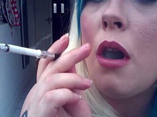 British BBW Tina Snua indulges in her smoking fetish with a slim cigarette in a matchlight up holder