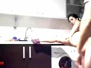 Watching her suck and fuck him in the kitchen