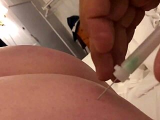 Blonde babe enjoys anal play with needles during blowjob