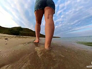 Explore the sandy shores with my bare feet