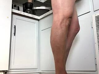 Solo amateur strokes shaved cock in kitchen