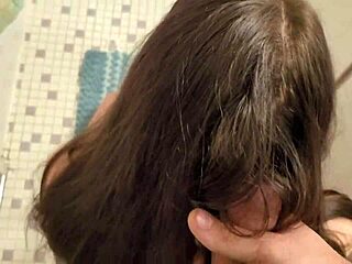 Brunette wife gets a cumshot in her hair and brushes it through